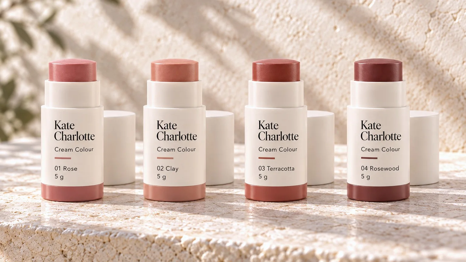 All four Cream Colour shades lined up on limestone: 01 Rose, 02 Clay, 03 Terracotta, 04 Rosewood